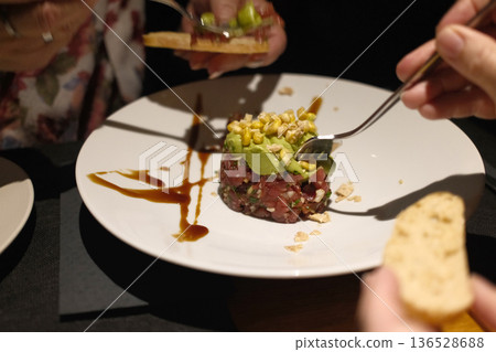 Fresh Tuna Tartare Served as Gourmet Appetizer 136528688