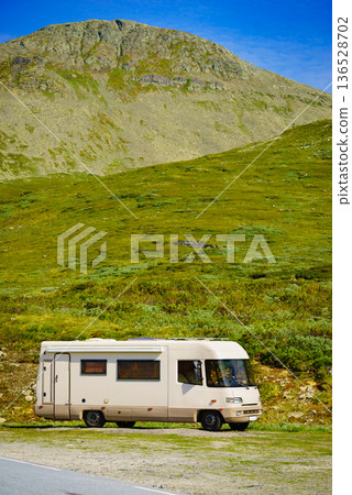 Camper car in norwegian mountains Camper car in norwegian mountains 136528702