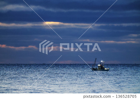 Winter seascape with fishing boats Winter seascape with fishing boats 136528705