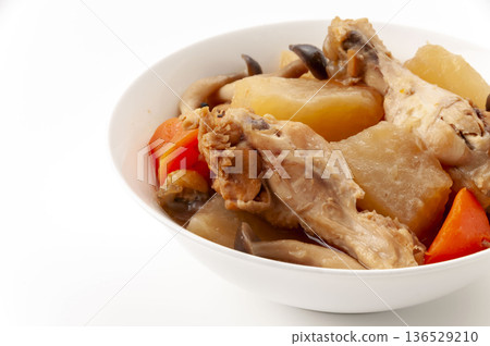 Chicken wings and radish stew with carrots and shimeji mushrooms, Japanese home cooking 136529210