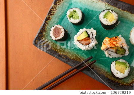 Assorted Sushi Platter on Elegant Plate Assorted Sushi Platter on Elegant Plate 136529219