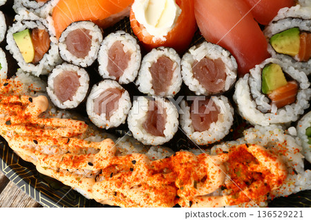 Assorted Sushi Platter on Elegant Plate Assorted Sushi Platter on Elegant Plate 136529221