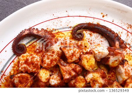 Galician Style Octopus with Paprika and Olive Oil Galician Style Octopus with Paprika and Olive Oil 136529349