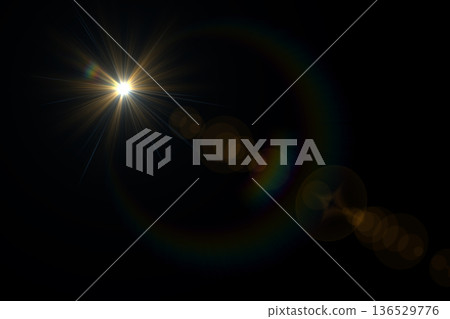 Natural Sun flare on the black. Lens flare. Natural Sun flare on the black. Lens flare. 136529776