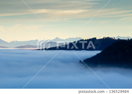 Landscape with sunset above the mountain tops in Austria Landscape with sunset above the mountain tops in Austria 136529984