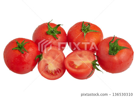 Whole and sliced red tomatoes isolated on white. 136530310