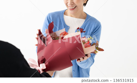 A woman with flowers 136531915