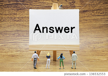 A canvas with the word "Answer" written on it A canvas with the word "Answer" written on it 136532553