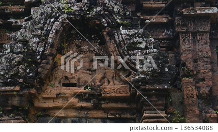 stone carving on ancient Cham temple stone carving on ancient Cham temple 136534088
