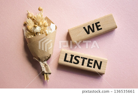 We listen symbol. Wooden blocks with words We listen. Beautiful pink background. Business and We listen concept. Copy space. We listen symbol. Wooden blocks with words We listen. Beautiful pink background. Business and We listen concept. Copy space. 136535661