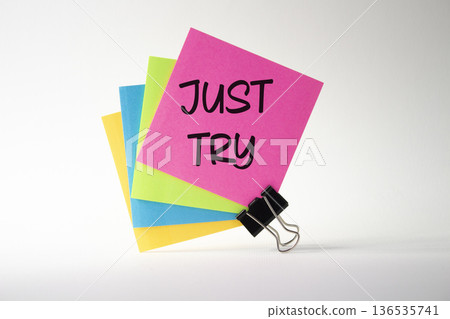 Just try symbol. Pink sticky note with words Just try. Beautiful white background. Business and Just Try concept. Copy space. Just try symbol. Pink sticky note with words Just try. Beautiful white background. Business and Just Try concept. Copy space. 136535741