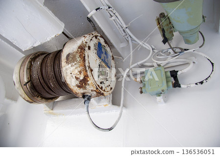 Rusty wire reels and wiring attached to the hull Rusty wire reels and wiring attached to the hull 136536051