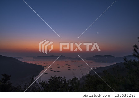 Beautiful sunrise seen from the sea at Mushiake, Setouchi City, Okayama Prefecture, Japan Beautiful sunrise seen from the sea at Mushiake, Setouchi City, Okayama Prefecture, Japan 136536285
