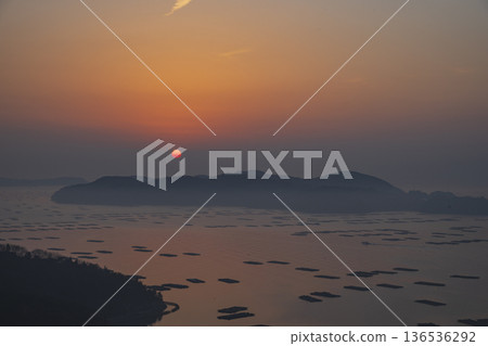 Beautiful sunrise seen from the sea at Mushiake, Setouchi City, Okayama Prefecture, Japan Beautiful sunrise seen from the sea at Mushiake, Setouchi City, Okayama Prefecture, Japan 136536292