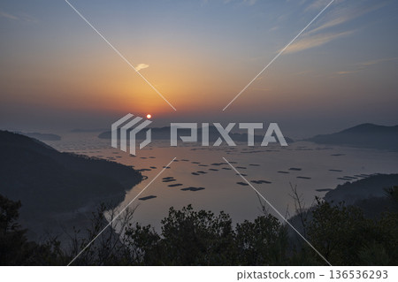 Beautiful sunrise seen from the sea at Mushiake, Setouchi City, Okayama Prefecture, Japan Beautiful sunrise seen from the sea at Mushiake, Setouchi City, Okayama Prefecture, Japan 136536293