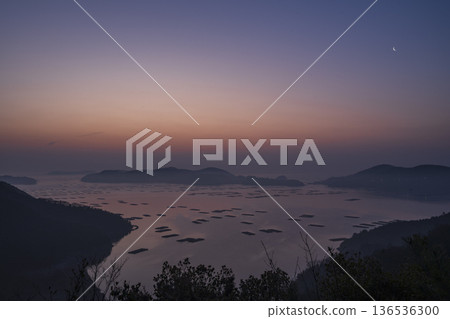 Beautiful sunrise seen from the sea at Mushiake, Setouchi City, Okayama Prefecture, Japan 136536300