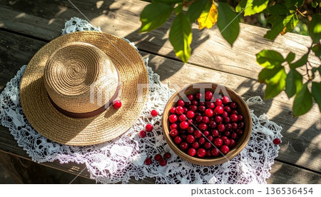 Cranberries with Straw Hat on Rustic Wooden Table Cranberries with Straw Hat on Rustic Wooden Table 136536454