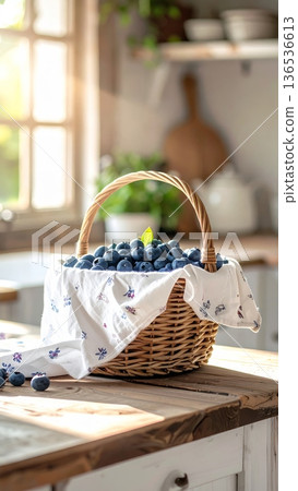 Picnic Basket with Blueberries on Wooden Counter in Cottage Kitchen 136536613