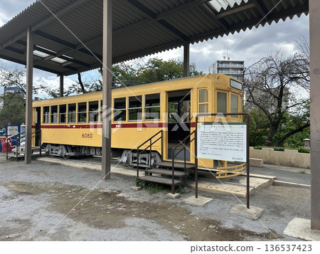 This is Toden 6080, a Toden tram car located at Oji Asukayama and Asukayama Park, a theme park adjacent to Oji Station in Kita Ward, Tokyo. This is Toden 6080, a Toden tram car located at Oji Asukayama and Asukayama Park, a theme park adjacent to Oji Station in Kita Ward, Tokyo. 136537423