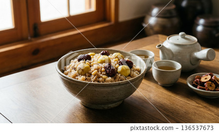Korean Yakbap Sweet Rice Bowl with Tea Set Traditional Serving on Wooden Table Korean Yakbap Sweet Rice Bowl with Tea Set Traditional Serving on Wooden Table 136537673
