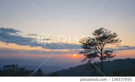 landscape and travel concept with timelapse sunset and twilight sky with layer of mountain landscape and travel concept with timelapse sunset and twilight sky with layer of mountain 136537693