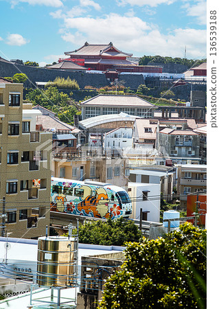 Shuri Castle and Monorail Shuri cityscape 136539188