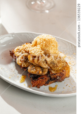 Banana caramel dessert with ice cream Banana caramel dessert with ice cream 136539229