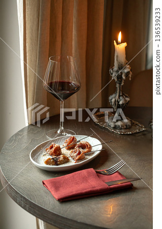 Bresaola skewers with honey ricotta and red wine Bresaola skewers with honey ricotta and red wine 136539233