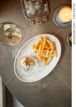 French fries with truffle ice cream 136539234