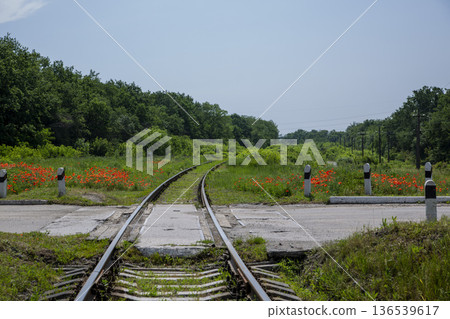 A fragment of a railroad track with rails A fragment of a railroad track with rails 136539617