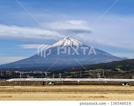 Shinkansen and Mt. Fuji seen from the countryside 136540019