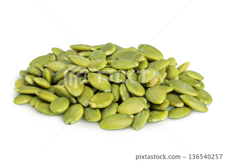 Peeled pumpkin seeds isolated on white background 136540257