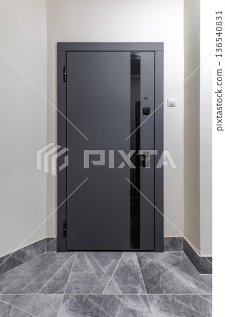 Minimalist Dark Grey Entrance Door in Modern Apartment Minimalist Dark Grey Entrance Door in Modern Apartment 136540831