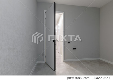 Modern Empty Room Interior with Open White Door Modern Empty Room Interior with Open White Door 136540835