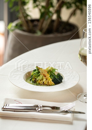 Grilled broccoli with green herb sauce Grilled broccoli with green herb sauce 136540896