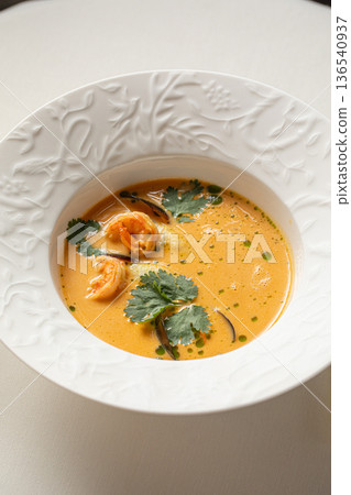 Creamy seafood soup with shrimp and herbs 136540937