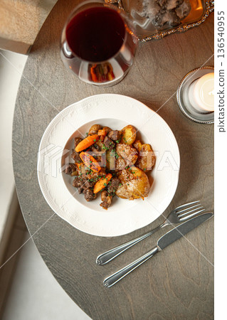 French beef bourguignon with wine and potatoes 136540955