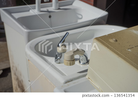 Discarded bathroom vanity Discarded bathroom vanity 136541354
