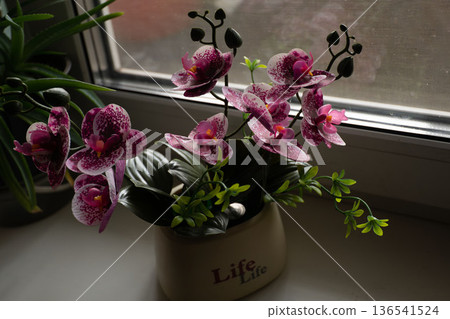 artificial flowers in pot 136541524