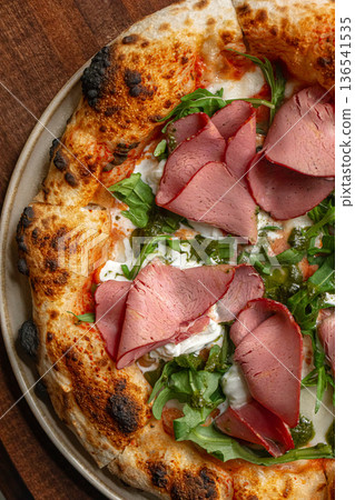 Pizza with roast beef arugula and cheese 136541535