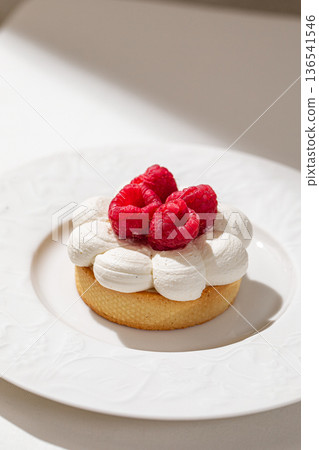 Raspberry dessert tart with whipped cream Raspberry dessert tart with whipped cream 136541546
