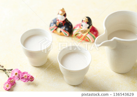 Amazake made with koji poured into a small cup Amazake made with koji poured into a small cup 136543629