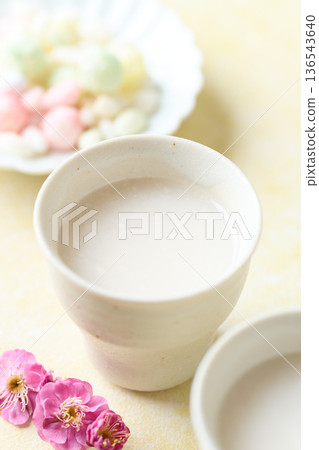Amazake made with koji poured into a small cup 136543640