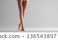 Woman's legs crossed, studio shot 136543897