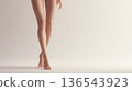 Woman's legs crossed, studio shot 136543923