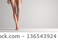 Woman's legs crossed, studio shot 136543924