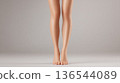 Women's legs, front view, studio shot 136544089