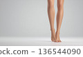 Women's legs, front view, studio shot 136544090