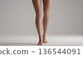 Women's legs, front view, studio shot 136544091
