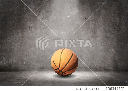 Basketball on concrete floor Basketball on concrete floor 136544251